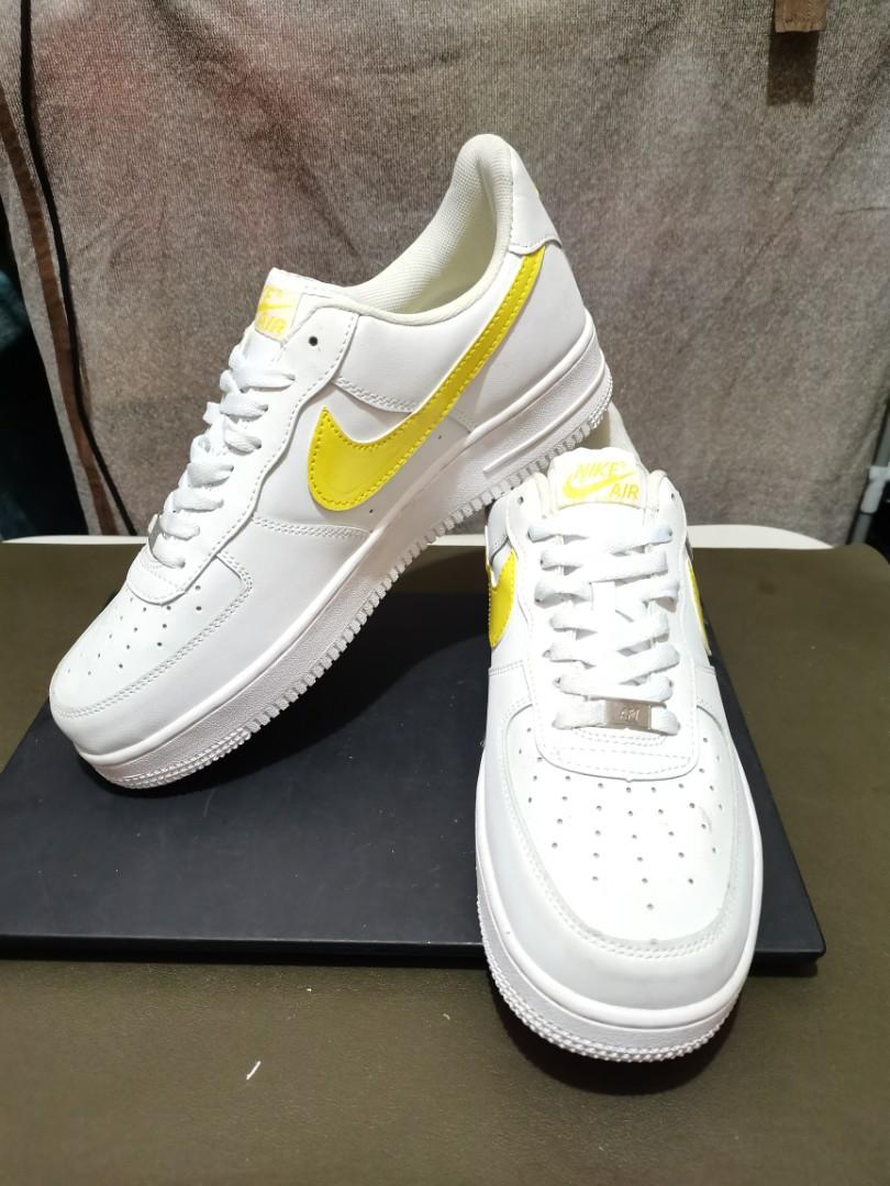 Nike with yellow swoosh shop