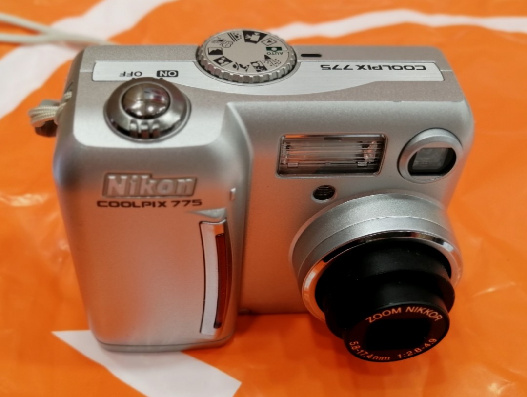 Nikon Coolpix 775數碼相機，靚仔！全正常使用！全新2CR5電池+CF卡+掛繩, 攝影器材, 相機 Carousell