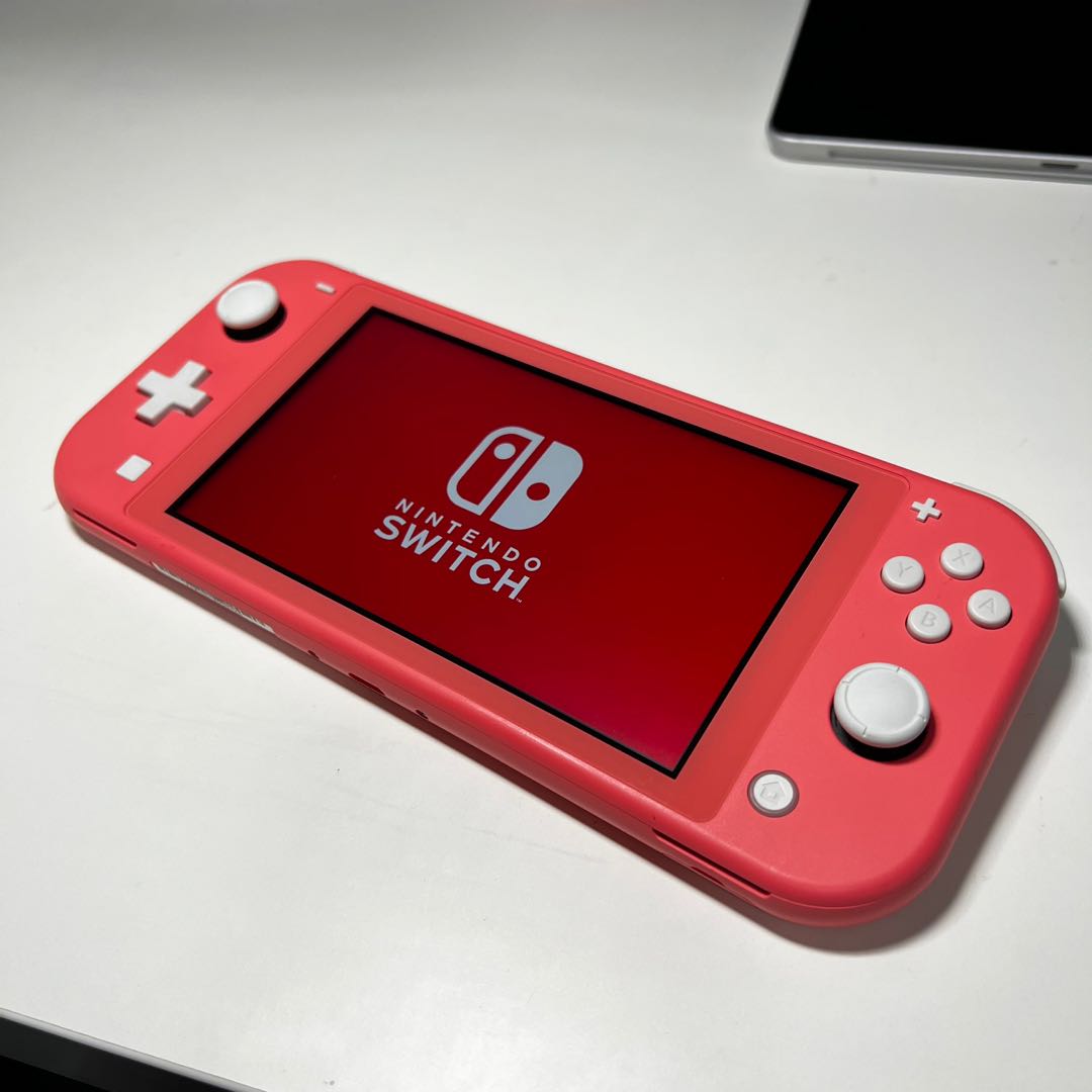 Pink Nintendo Switch Lite in good condition, Video Gaming, Video Game