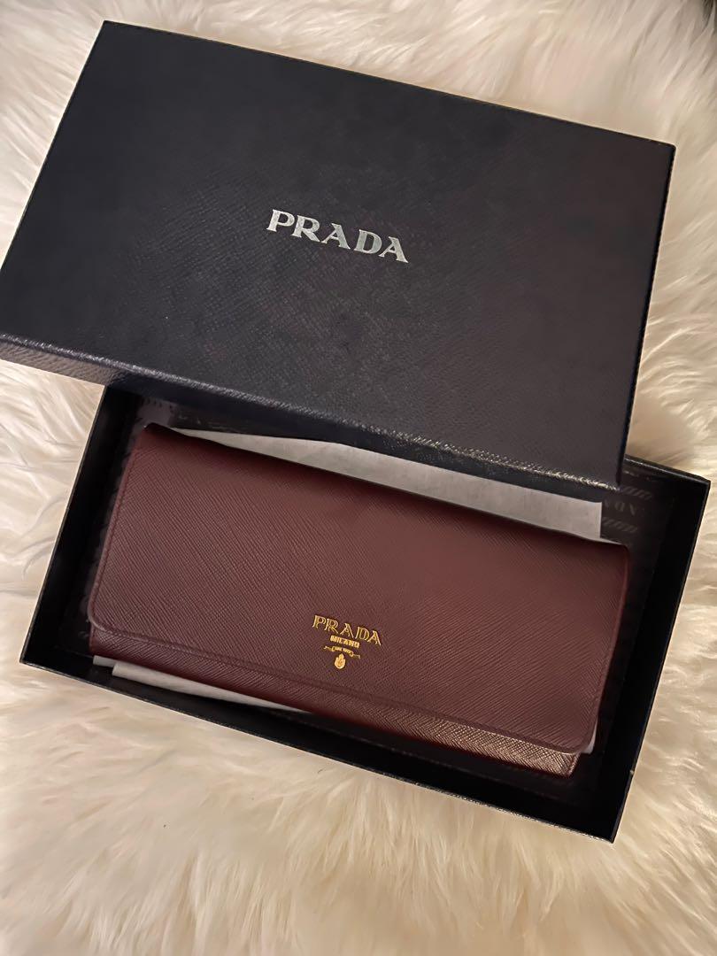 Prada Wallet Chain Bag (Category: Luxury) located in Toronto. Submitted by sn.closetsale (Listing ID 1138954999, Image 2). Description: Prada Vitello in burgundy leather. In very good condition, like new. Bought from Prada store in Hong Kong. • Gold-Tone Hardware Chain-Link Shoulder Strap Canvas Lining & Three Interior Pockets with Card Slots Snap Closure at Front • Price negotiable. .