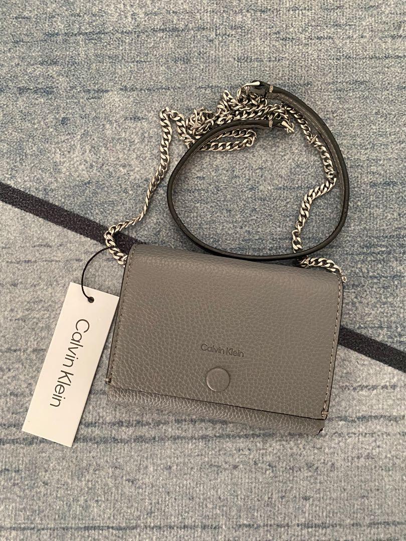 Brand new Calvin Klein Small Wallet on Chain, Women's Fashion, Bags &  Wallets, Wallets & Card holders on Carousell