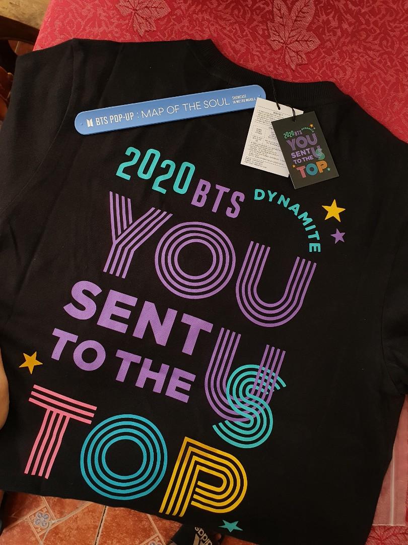 BTS On Top Dynamite Celebration Shirt (Official) (Category: Tshirts & Polo Shirts ) located in Manila. Submitted by boramartph (Listing ID 1139197861, Image 2). Description: Official from BTS Pop Up Store Metro Manila (Bought last July 2021) Size: Medium Used only once or twice Original Price was at P2,200 RFS: Size is a bit too big for me :( Original Plastic included **Pop Up Store Band & Idol Tote Bag not included**.