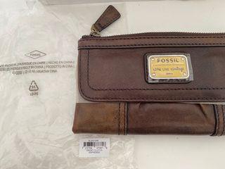 DOMPET FOSSIL BARU