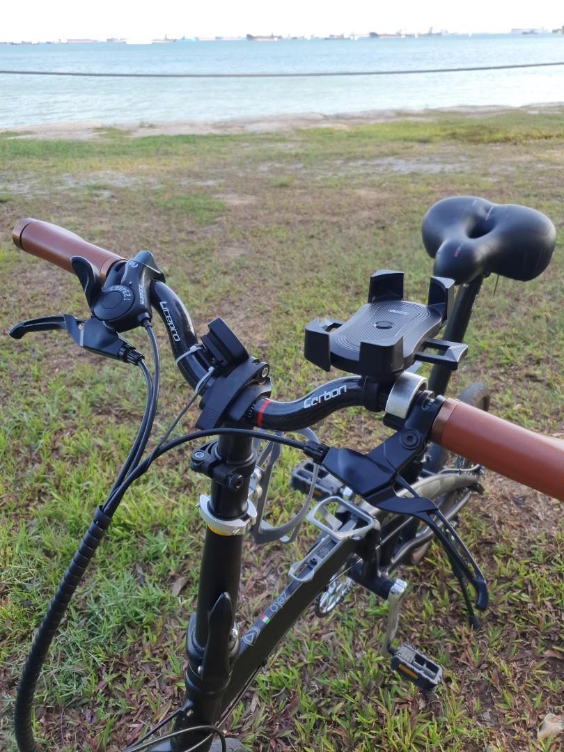 Java zelo foldable bicycle (Category: Bicycles) located in Singapore. Submitted by essentialstation (Listing ID 1139201636, Image 2). Description: java brand is design in italy 🇮🇹 java zelo upgraded Beautiful black frame with shiny sliver 1.Litepro carbon handle bar 2.Litepro carbon seat pole 3.Litepro Hollowtech 56 teeth crankset Smoother ride and reduce weight _________________________________________________________ Tyre and brake condition 
