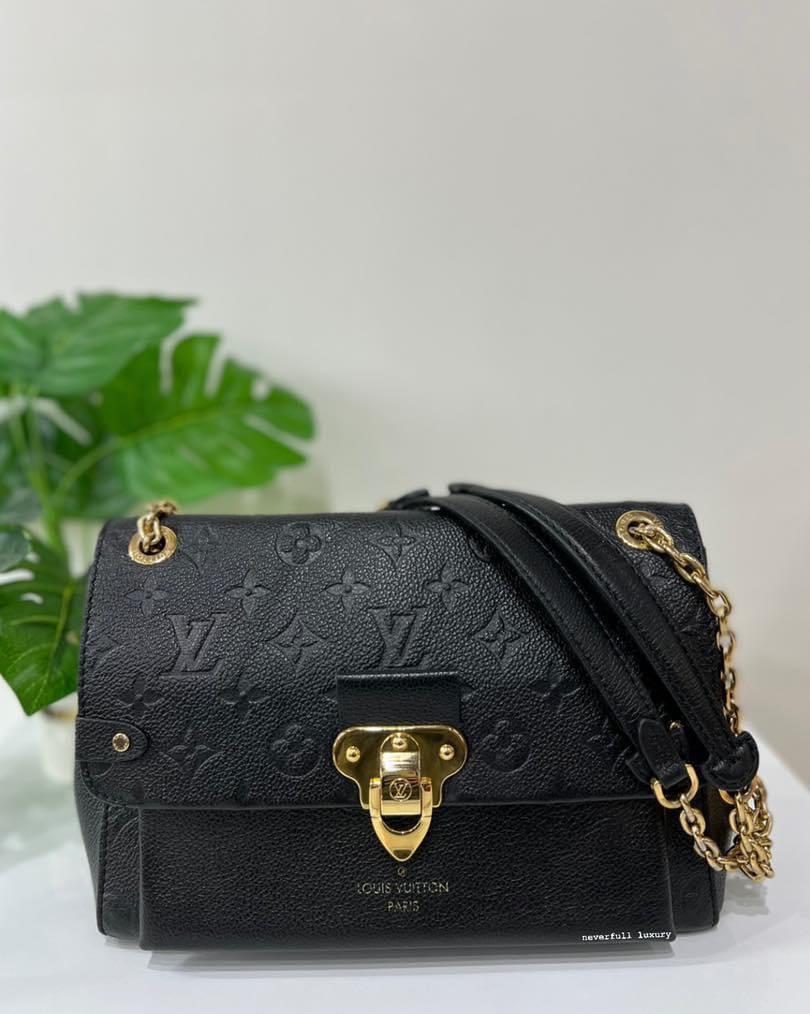 Louis Vuitton Vavin WOC Noir Monogram Empreinte Leather Bag, Luxury, Bags &  Wallets on Carousell