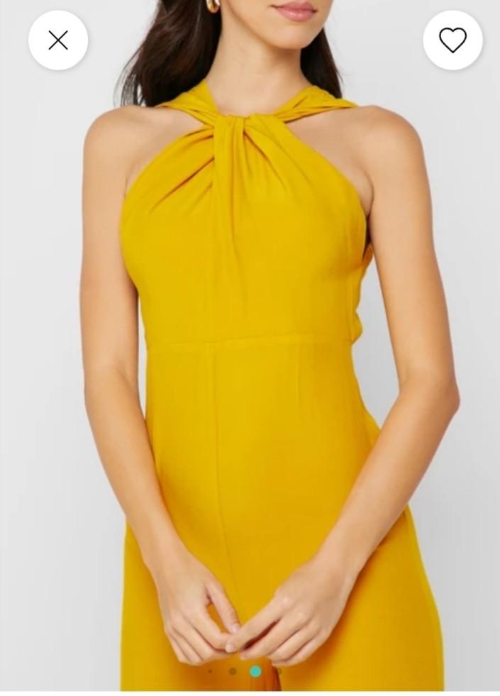 Mango yellow solid basic jumpsuit (Category: Jumpsuits) located in Quezon City. Submitted by kishcloset (Listing ID 1139334304, Image 2). Description: authentic mango size large but altered to fit small, gartherized. brandnew, never used. pretty when worn.