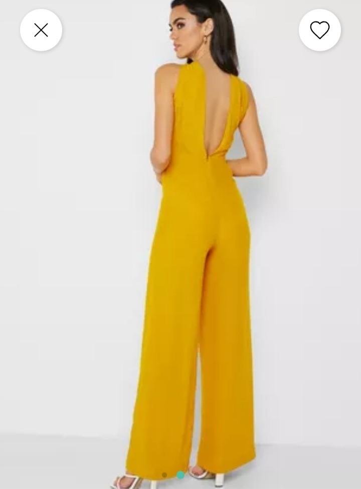 Mango yellow solid basic jumpsuit (Category: Jumpsuits) located in Quezon City. Submitted by kishcloset (Listing ID 1139334304, Image 3). Description: authentic mango size large but altered to fit small, gartherized. brandnew, never used. pretty when worn.