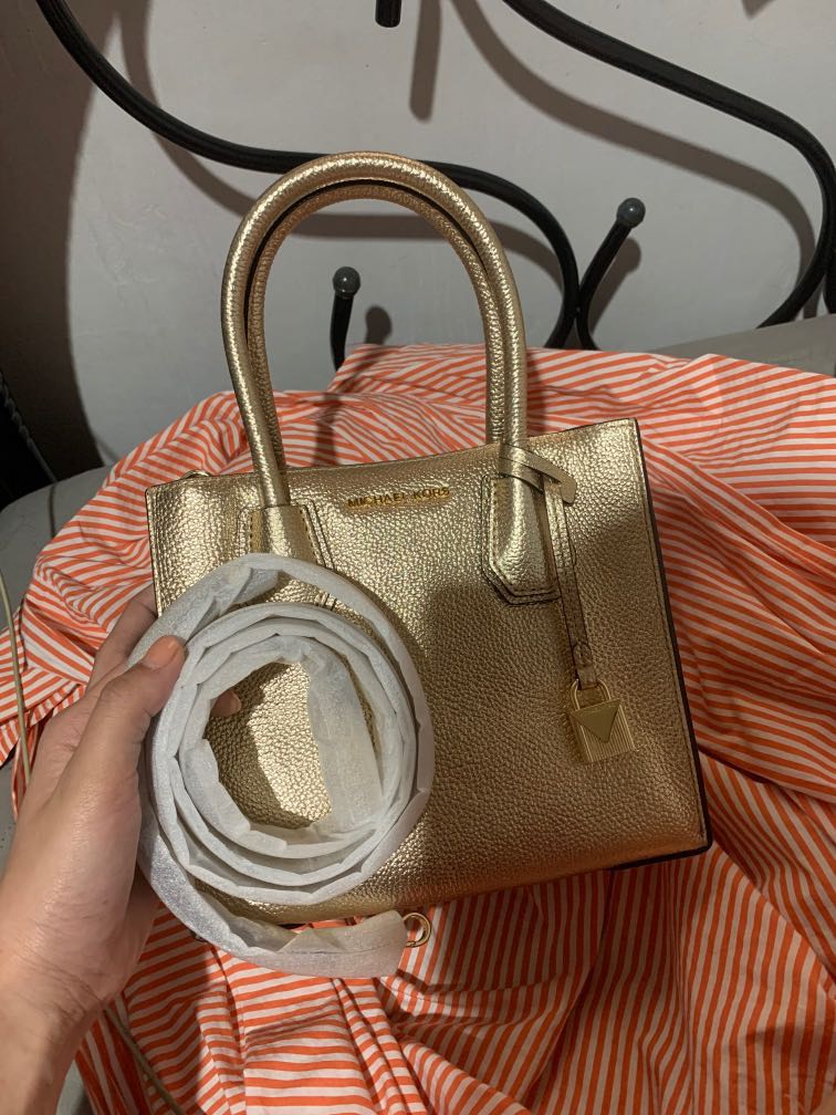 Michael Kors Mercer Bag in Pale Gold Pebble Leather Women s