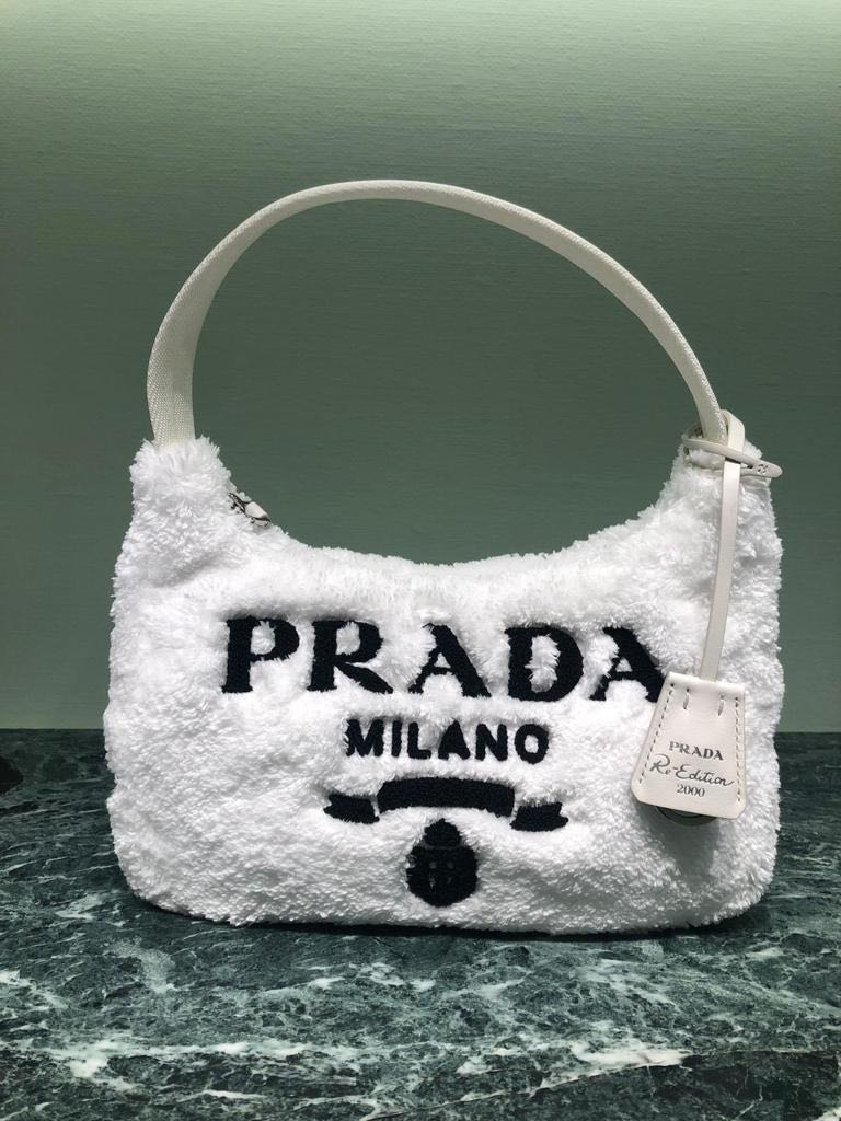 Prada terry mini bag, Women's Fashion, Bags & Wallets, Tote Bags on  Carousell
