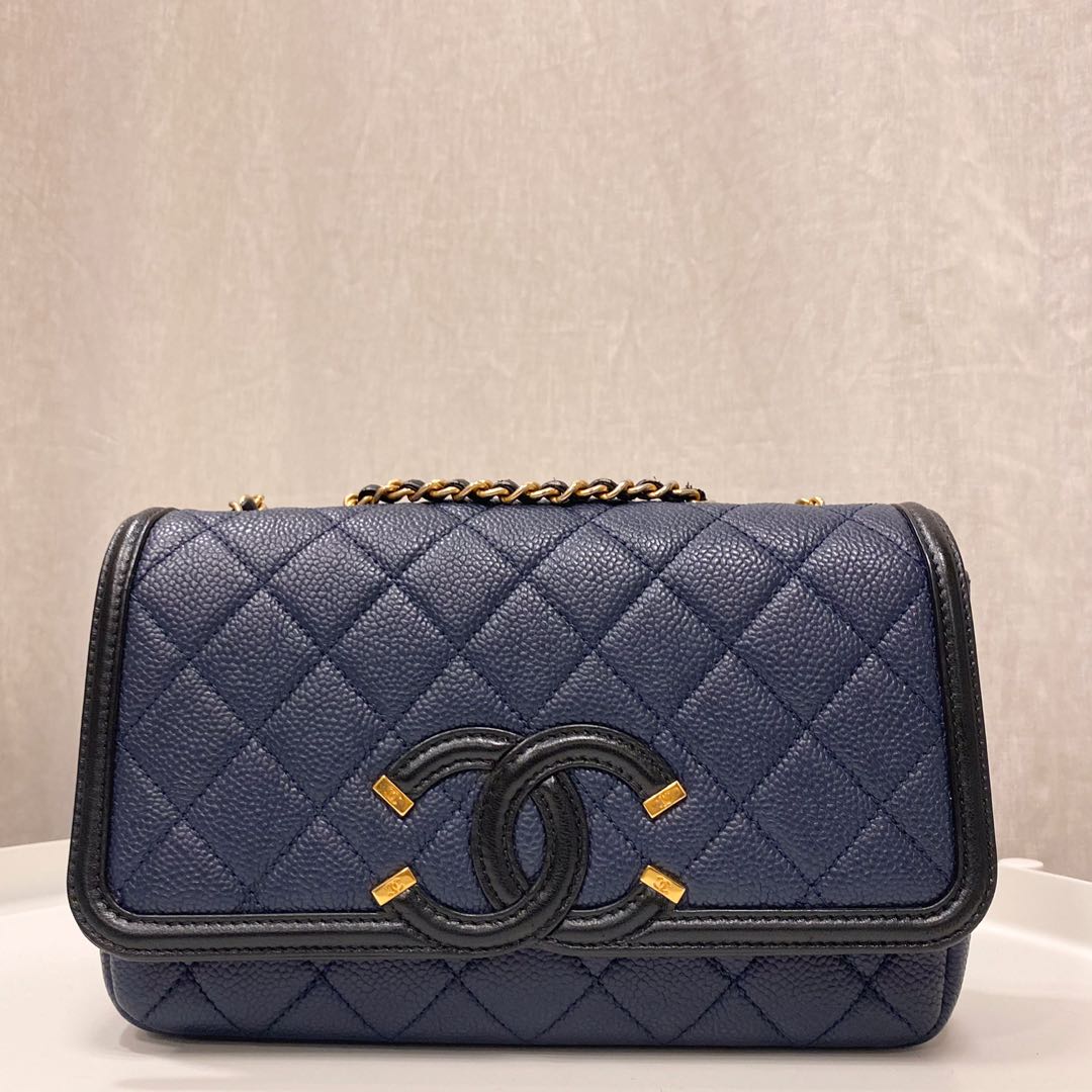 Authentic Chanel Navy Small CC Filigree Flap bag in Caviar and