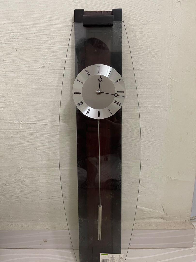 Pendulum Wall Clock (Category: Clocks) located in Singapore. Submitted by shirmon1 (Listing ID 1139450901, Image 2). Description: Never used before and fully wrap Measuring 72cm in height and 12 cm in width Tested and in working condition .