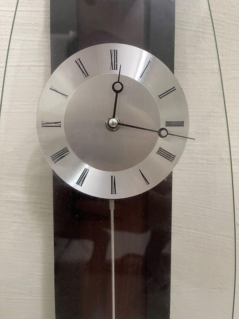 Pendulum Wall Clock (Category: Clocks) located in Singapore. Submitted by shirmon1 (Listing ID 1139450901, Image 1). Description: Never used before and fully wrap Measuring 72cm in height and 12 cm in width Tested and in working condition .