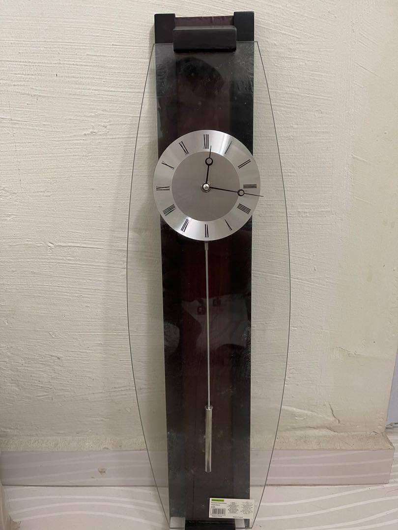 Pendulum Wall Clock (Category: Clocks) located in Singapore. Submitted by shirmon1 (Listing ID 1139450901, Image 3). Description: Never used before and fully wrap Measuring 72cm in height and 12 cm in width Tested and in working condition .