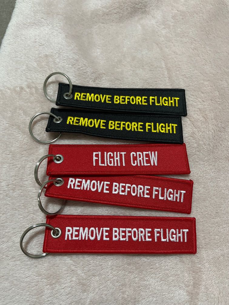 Remove before flight Keychain, Hobbies & Toys, Travel, Travel Essentials & Accessories on Carousell