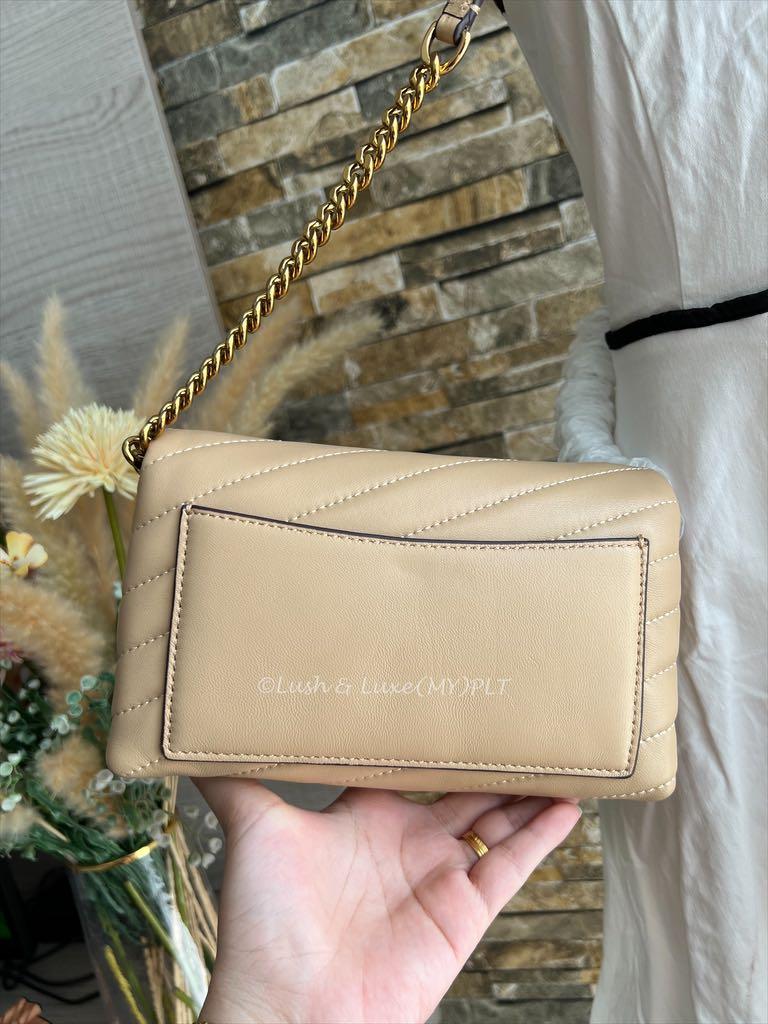 Kira chevron clearance clutch bag