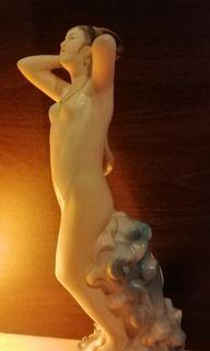 Figure - half covered fairy