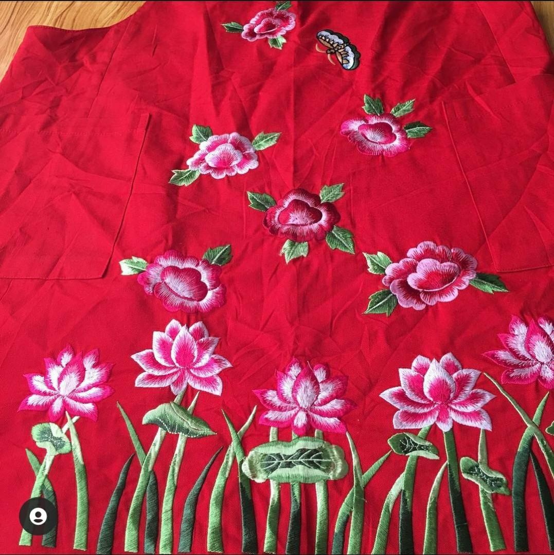 Embroidered Kitchen Apron ***on sale (Category: Others Tops) located in Quezon City. Submitted by eelzysbestfinds (Listing ID 1139788835, Image 2). Description: Full embroidery pink flowers in stiff green stems, all so pretty on this red kitchen apron..