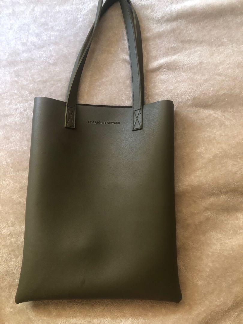 Straightforward leather bag (Category: Tote Bags) located in Manila. Submitted by shaddie (Listing ID 1139631962, Image 1). Description: Legit 💯 Tote bag or laptop bag Good as new RFS: Decluttering .