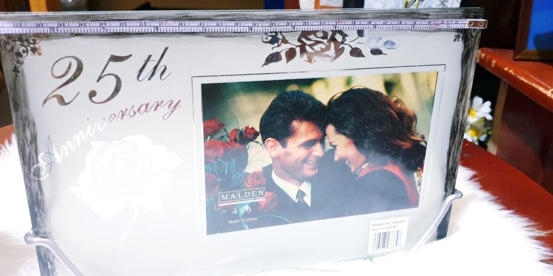 25th wedding anniversary frame glass (Category: Frames & Pictures) located in Dumaguete. Submitted by ellelopez35 (Listing ID 1140022287, Image 1). Description: 25th wedding anniversary frame glass 17inches width 6inches height a little chips but not visible see picture ..