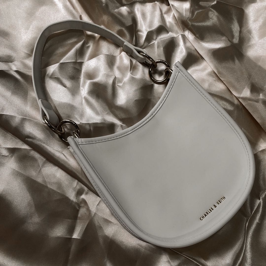 CHARLES AND KEITH SADDLE SLING BAG, Luxury, Bags & Wallets on Carousell