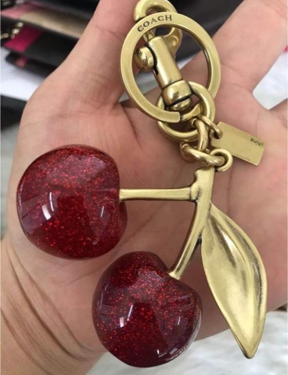 Coach cherry bag charm discount