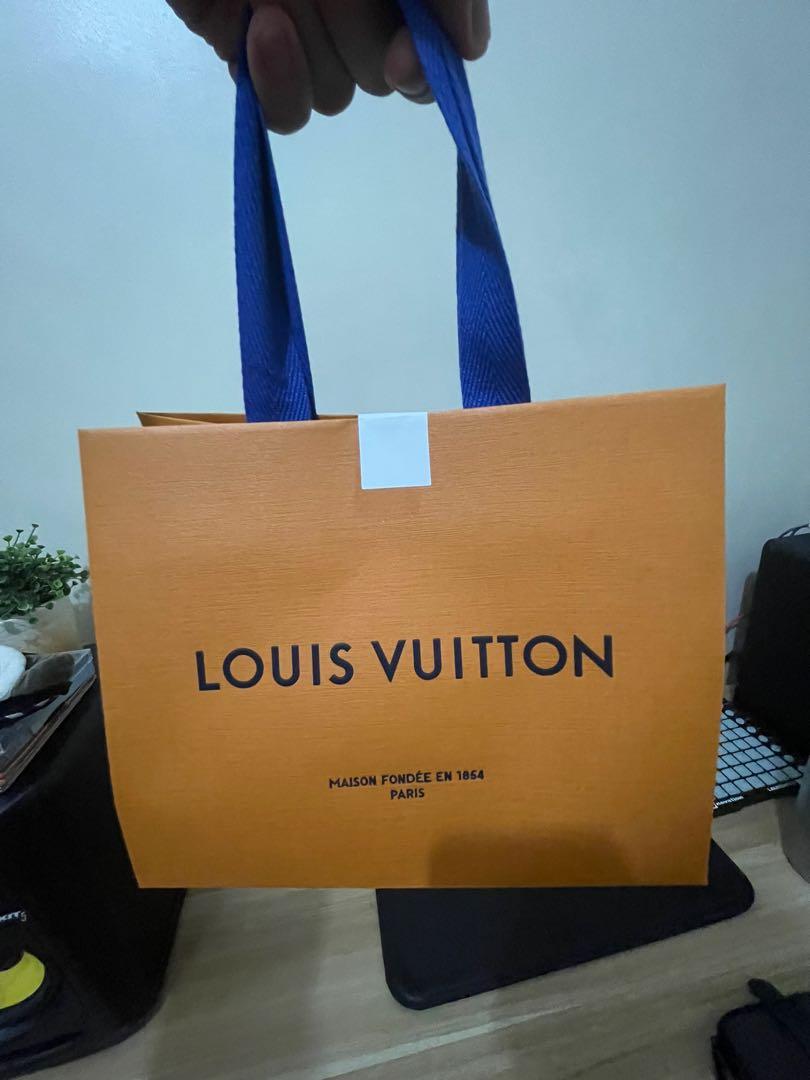 Louis Vuitton Paper Bag - Small (Category: Tote Bags) located in Paranaque City. Submitted by johnsclutter (Listing ID 1139980266, Image 3). Description: Selling my small Louis Vuitton paper bag. Brand new. This is the paper bag included with purchased LV perfume as of 26 Jan 2022. No damages, scratches, folds..