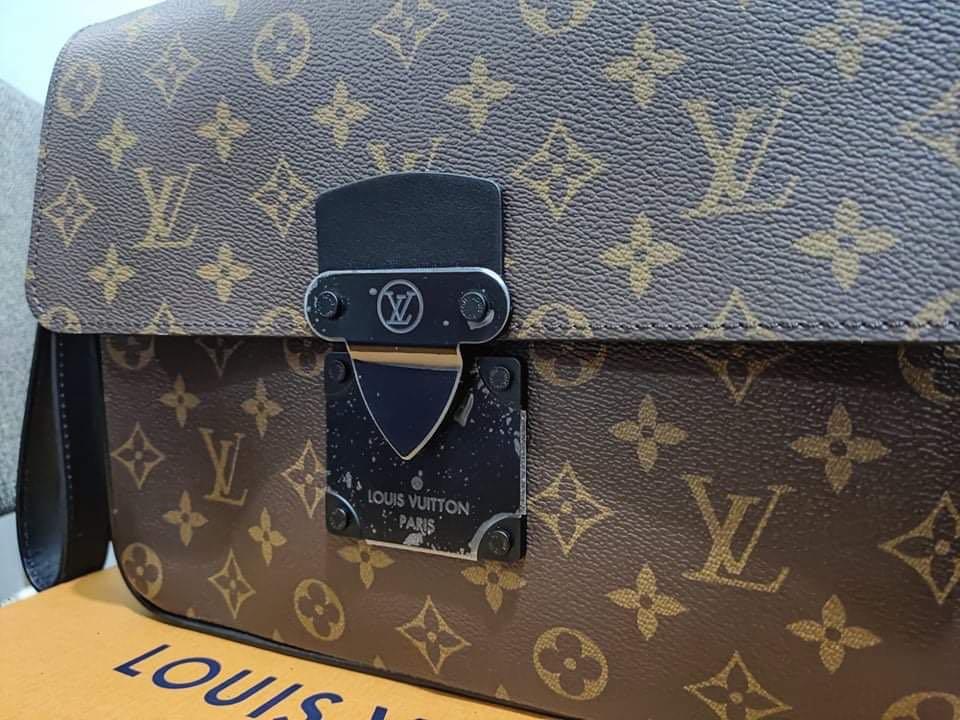 Louis #Vuitton S LOCK A4 POUCH - Shopping District Qatar
