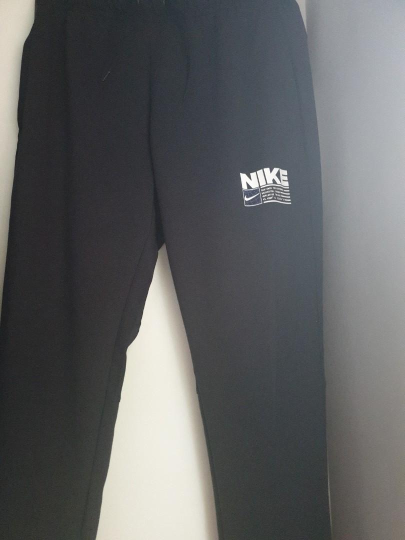 Nike drifit tapered joggers, Men's Fashion, Bottoms, Joggers on Carousell