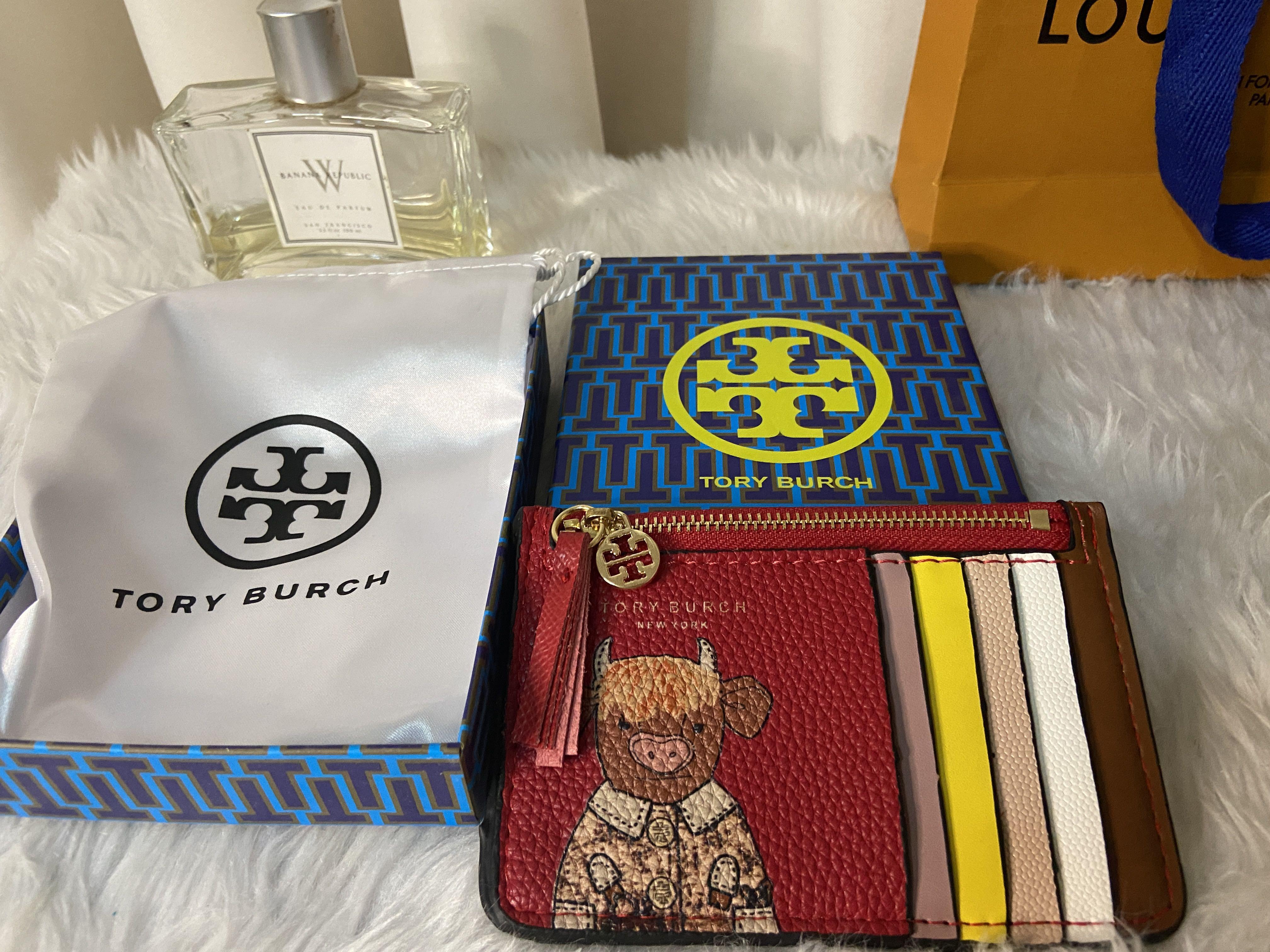 Tory burch slim cardholder ox wallet preorder (Category: Luxury Bags & Wallets) located in Mandaluyong City. Submitted by japanandsingaporeluxepreloved (Listing ID 1139943672, Image 1). Description: Additional 150 for dustbag and box.