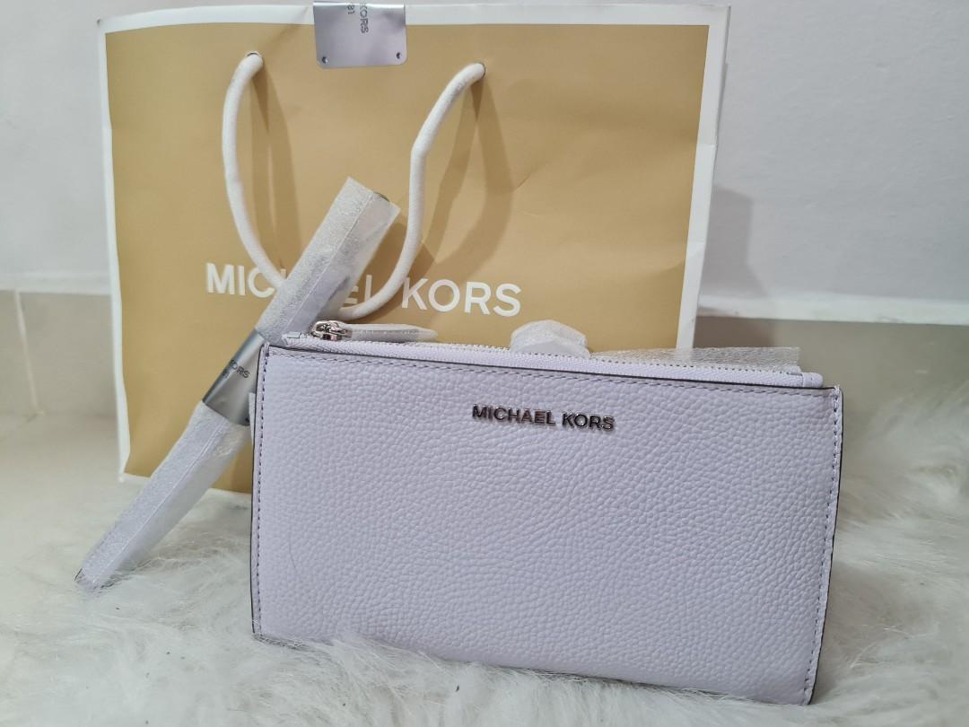 Brand new Michael Kors purse (light purple), Women's Fashion, Bags & Wallets,  Purses & Pouches on Carousell