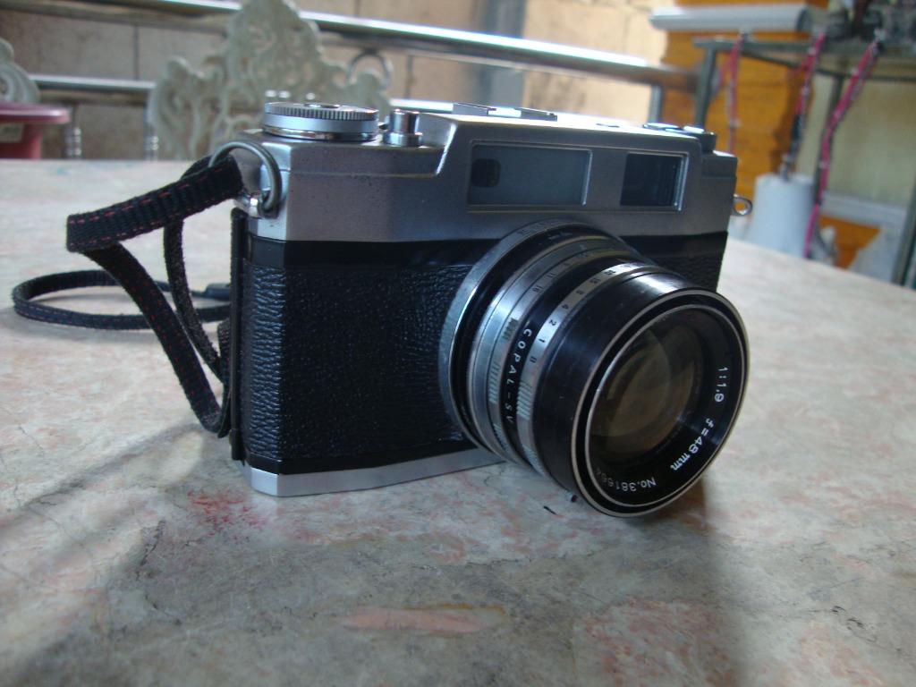 Mamiya Vintage Film Camera (Category: Cameras) located in Manila. Submitted by parokya_ni_edgar (Listing ID 1140142014, Image 3). Description: Appearance: Excellent. Condition: Good Working Condition. No Issues Film Format: 35mm/135 Made in Japan Packaged include: - Strap - Case.