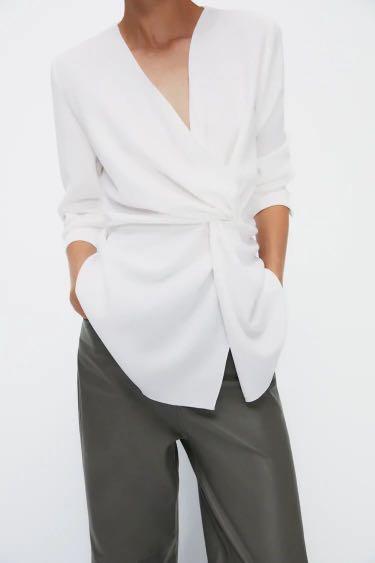 BNWT Zara White Draped Knot Top (Category: Longsleeves) located in Marikina City. Submitted by _brandsforless_ (Listing ID 1140335497, Image 2). Description: New with tag. Size L on tag, fits M to L.