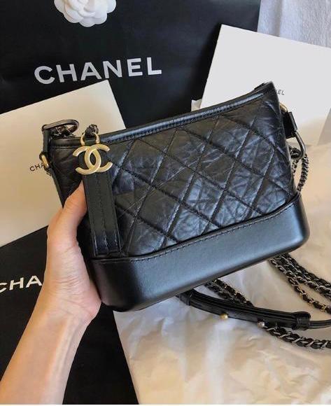 Shop CHANEL Chanel's Gabrielle Small Hobo Bag (A91810 Y61477 94305) by JOY＋