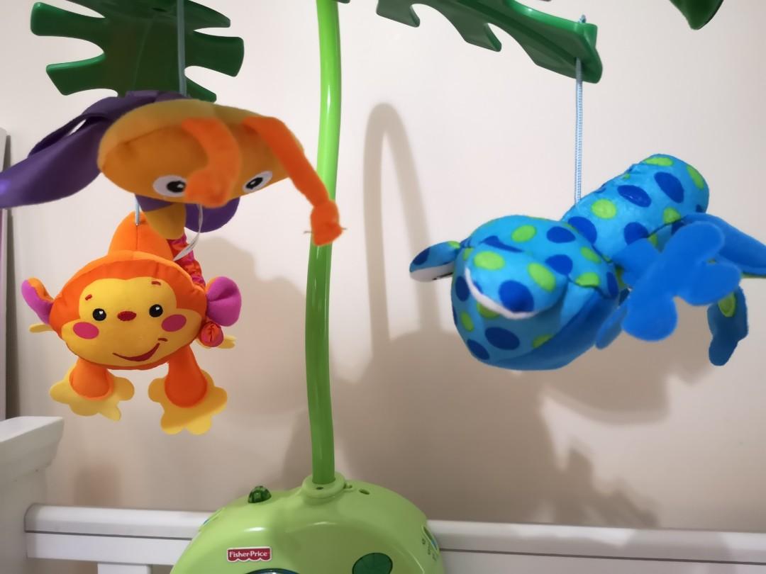FisherPrice Rainforest PeekaBoo Leaves Musical Mobile, Babies & Kids