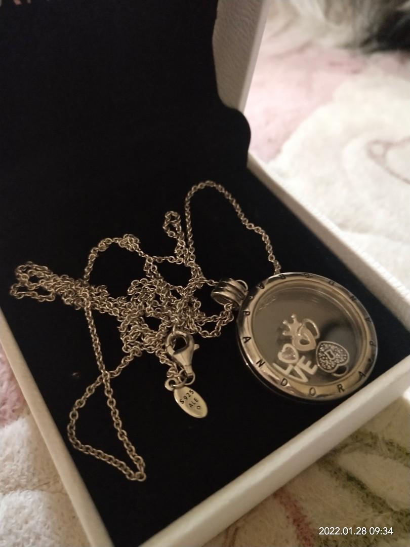 Pandora Locket Necklace with small charms (Category: Luxury Accessories) located in Manila. Submitted by onlineshopmate (Listing ID 1140356117, Image 2). Description: Pandora Locket Necklace With complete Inclusion Box Paperbag we ship via lalamove Ship same day cod gcash J&T For more details pls message us thanks and God bless....