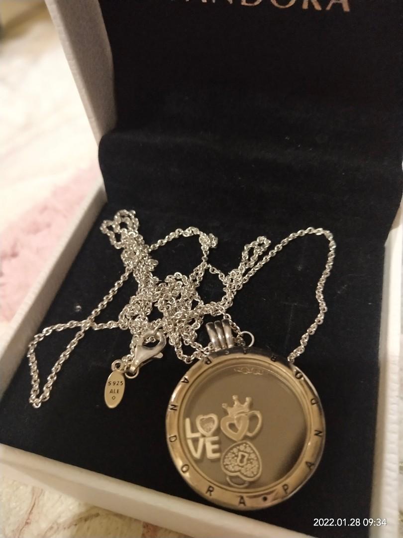 Pandora Locket Necklace with small charms (Category: Luxury Accessories) located in Manila. Submitted by onlineshopmate (Listing ID 1140356117, Image 3). Description: Pandora Locket Necklace With complete Inclusion Box Paperbag we ship via lalamove Ship same day cod gcash J&T For more details pls message us thanks and God bless....