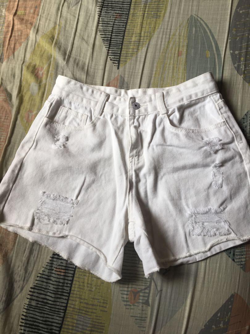 White highwaisted tattered shorts | size 30 (Category: Shorts) located in Paranaque City. Submitted by 0189cart (Listing ID 1140303589, Image 1). Description: White highwaisted tattered shorts size 30 has no flaws ‼️ MINT CONDITION ‼️ pm for more photos/when worn NO REFUND/RETURN .