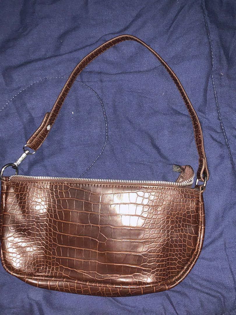 Brown Shoulder Bag/Baguette Bag (Category: Shoulder Bags) located in Manila. Submitted by migasclothes (Listing ID 1140578052, Image 2). Description: - bought in shopee - good condition.