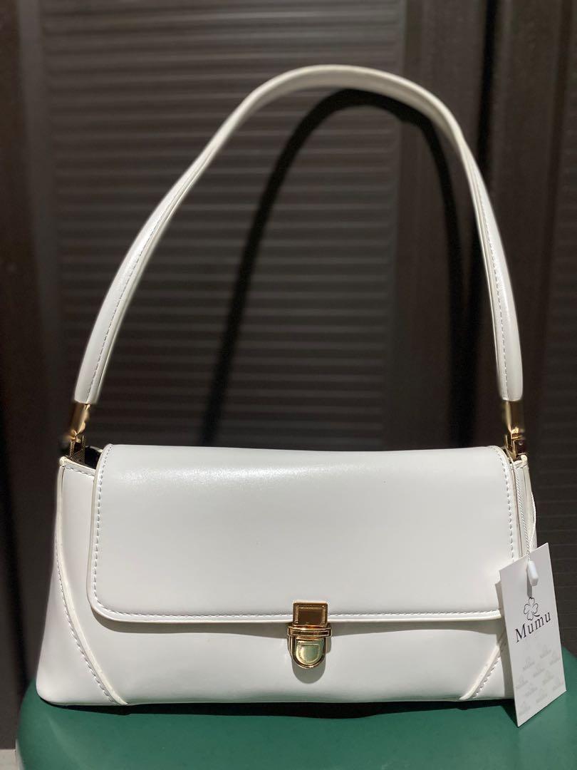 Trendy Long Handle Kili Bag (Category: Shoulder Bags) located in Makati City. Submitted by clothique.ph (Listing ID 1140500854, Image 1). Description: BRAND NEW WITH TAG MUMU BRAND KILI STYLE IN LONG HANDLE No Flaw Color: White Pearl Pm me once you're interested HAPPY SHOPPING .
