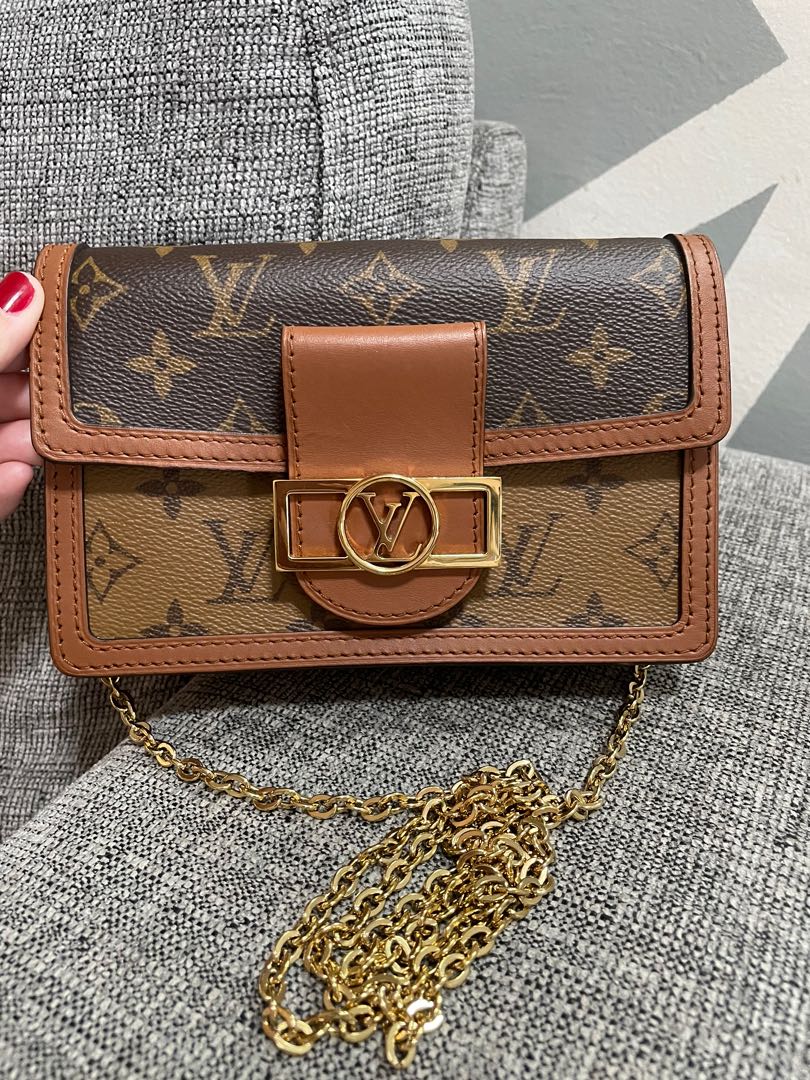 Lv Dauphine Wallet On Chain Link Fence