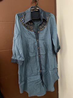 Blue dress with bead accents