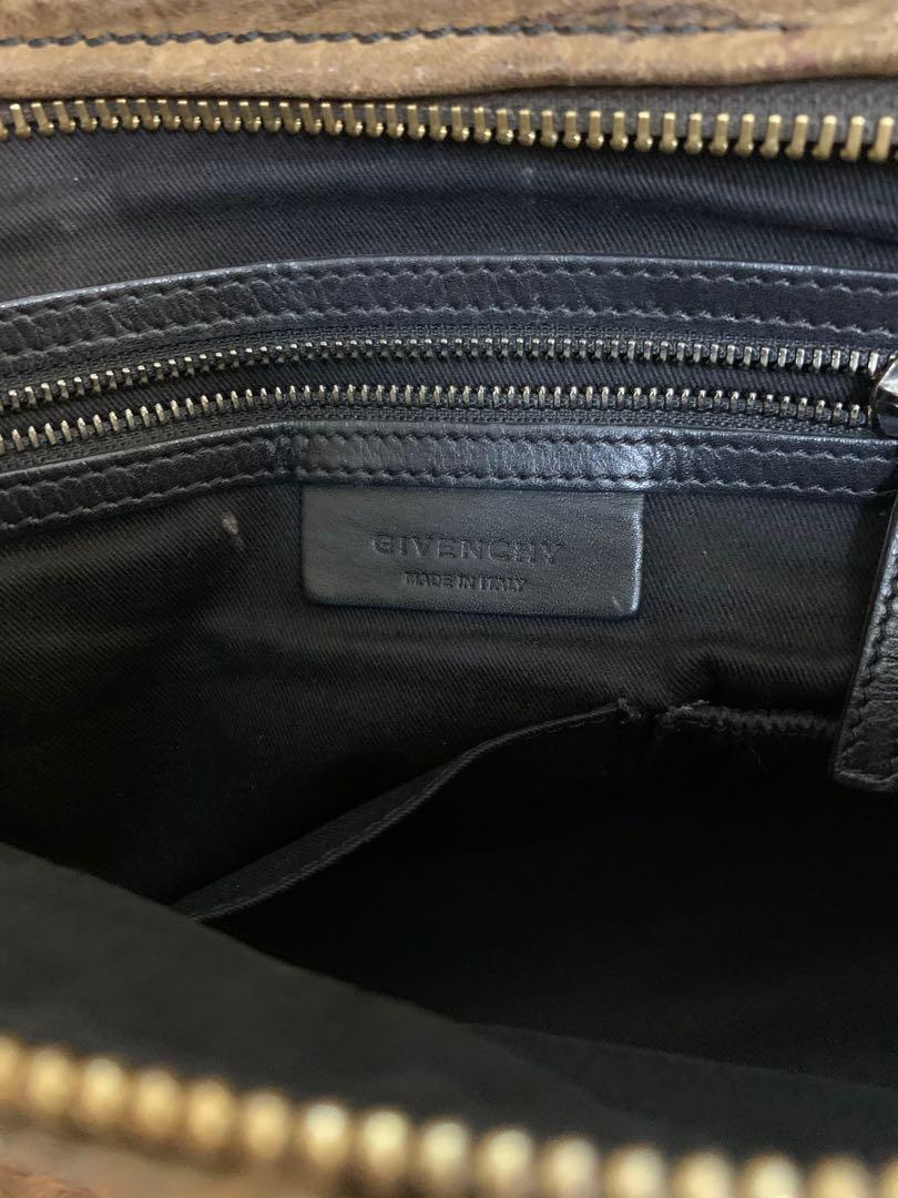 Givenchy Pandora Medium (Category: Luxury Bags & Wallets) located in Paranaque City. Submitted by listitwithb (Listing ID 1135085997, Image 3). Description: GIVENCHY Walnut Brown Textured Leather PANDORA Convertible Shoulder Bag This is the "Pandora" convertible shoulder bag by Givenchy. This bag is a convertible design with one rolled leather top handle and one detachable flat leather strap. It has two exterior zip pockets and one interior zip p