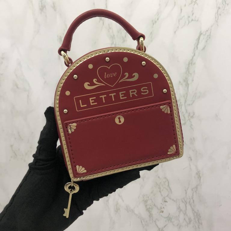 Kate spade love best sale letters bag