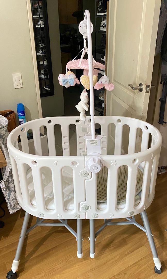 Pottery barn oval crib 2025