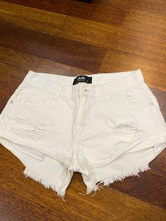 White distressed denim shorts