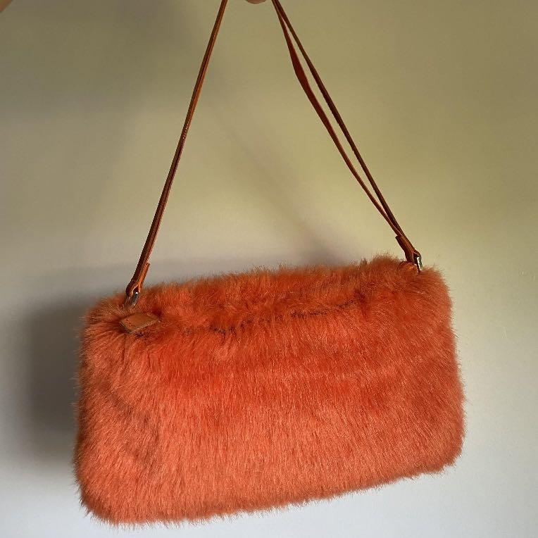 fluffy orange bag