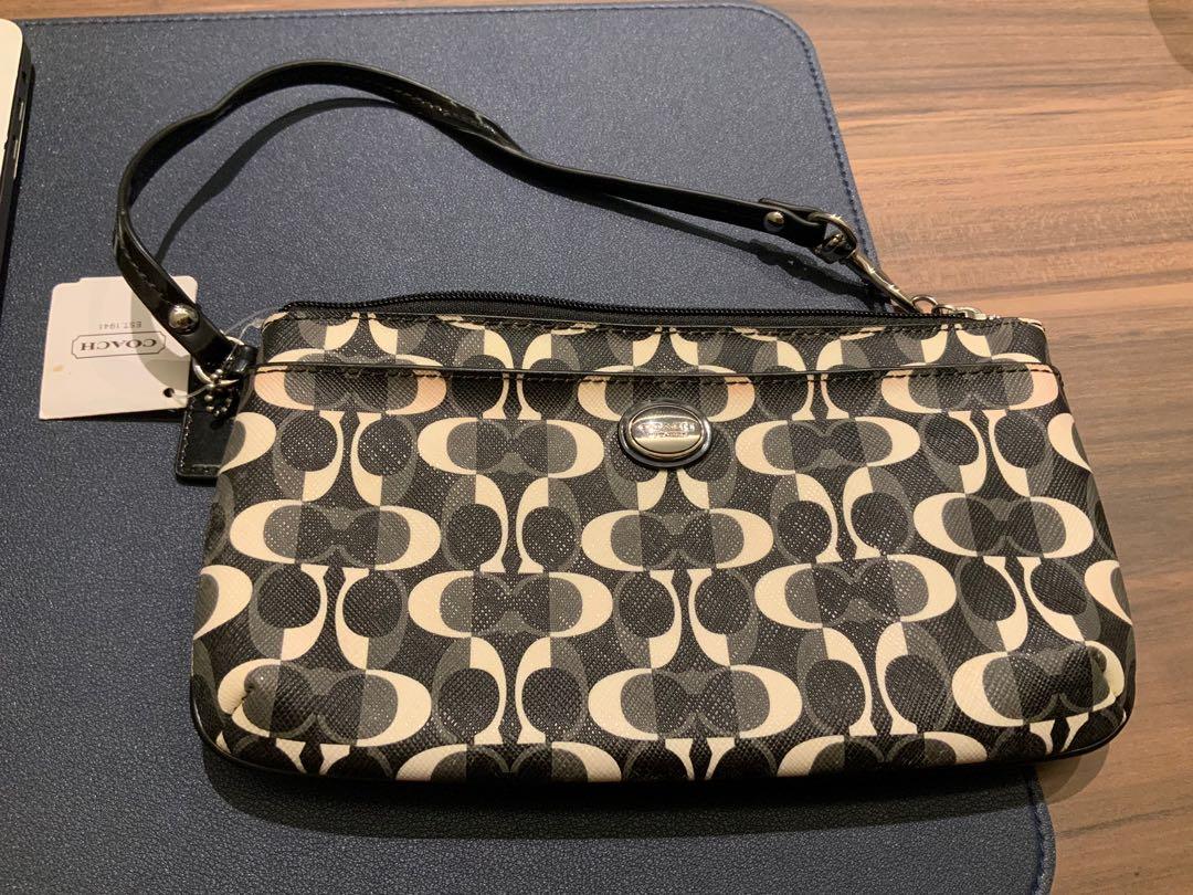 Coach clutch bag price clearance