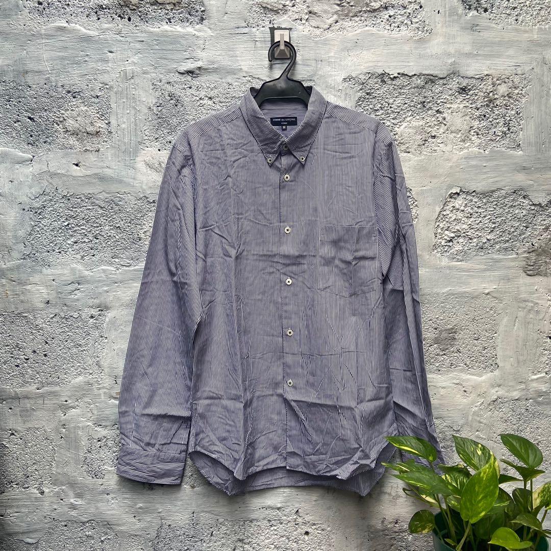 Comme des Garcons Homme (Category: Formal Shirts) located in Pasig City. Submitted by danielle_mikael (Listing ID 1140647277, Image 1). Description: Comme des Garcons Homme Long sleeve Medium in size Dimension: 20x28 inches No issue Plus shipping fee.