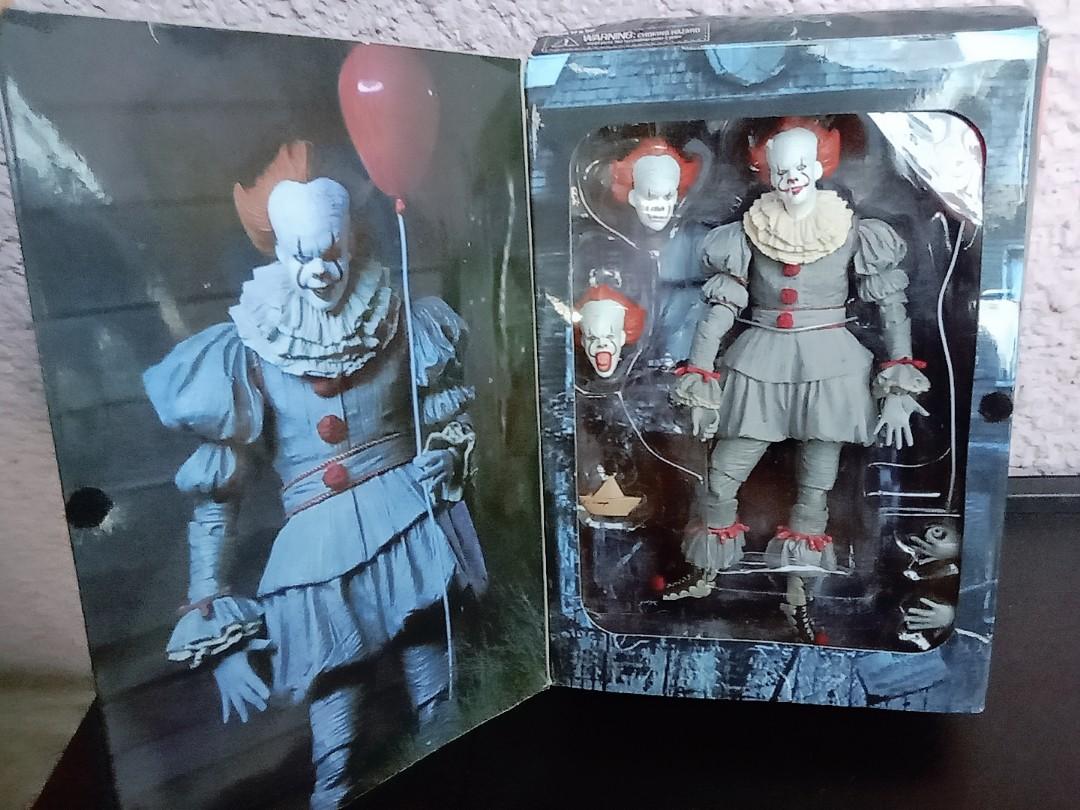 Pennywise Action Figure, IT You'll float too. 7 inches (Category: Figurines & Statues) located in Manila. Submitted by jekkoy (Listing ID 1140651680, Image 2). Description: Includes 3 interchangeable Heads, hands, 1 balloon and a paper boat. *Slightly damaged box as seen on posted photos. * Bootleg.