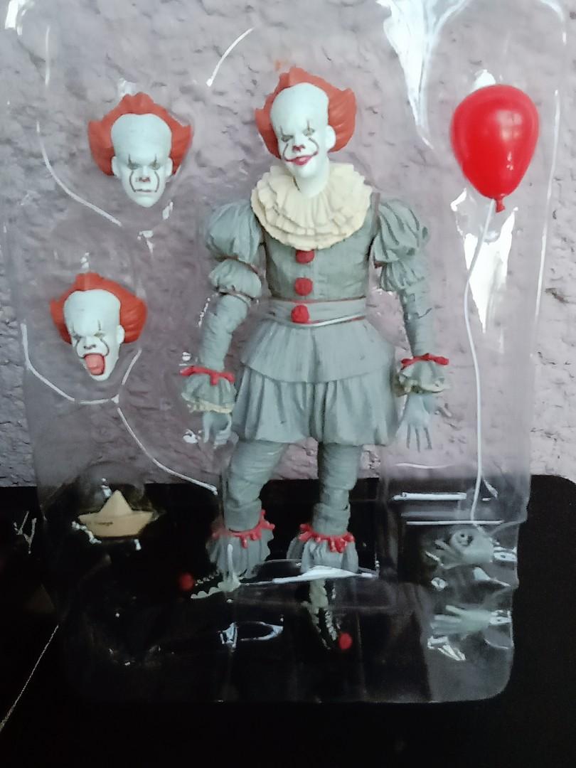 Pennywise Action Figure, IT You'll float too. 7 inches (Category: Figurines & Statues) located in Manila. Submitted by jekkoy (Listing ID 1140651680, Image 1). Description: Includes 3 interchangeable Heads, hands, 1 balloon and a paper boat. *Slightly damaged box as seen on posted photos. * Bootleg.